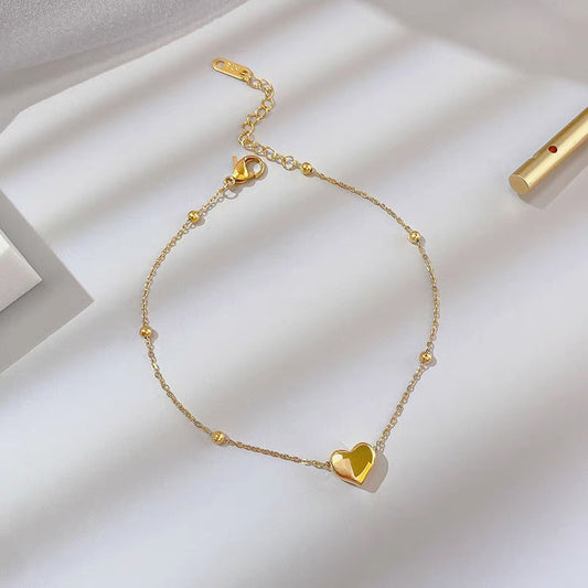 Gold Heart-Shaped Pendant Bracelet in Titanium Steel