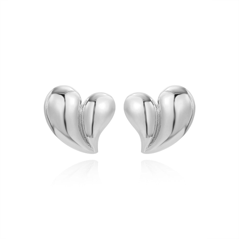 Shiny 18K gold heart-shaped earrings with copper plating featuring a simple love design by Strovlin