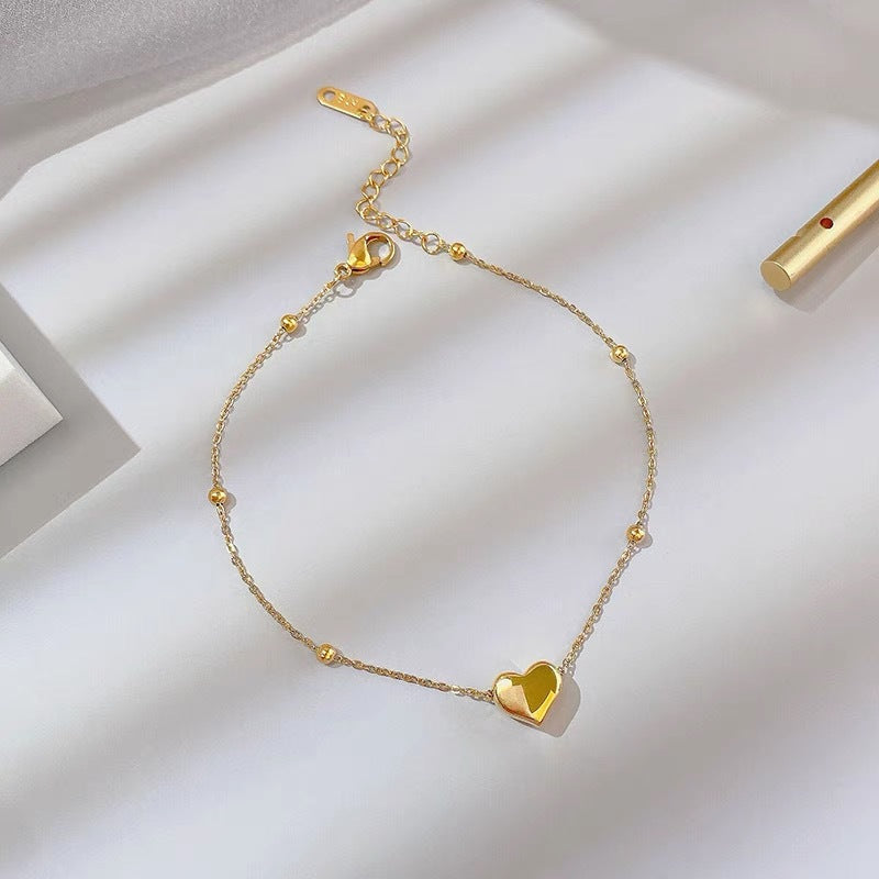 Gold Heart-Shaped Pendant Bracelet in Titanium Steel