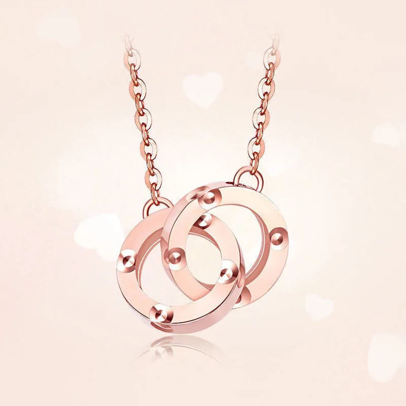 14K rose gold double ring pendant necklace for women featuring elegant design and fine craftsmanship by Strovlin.