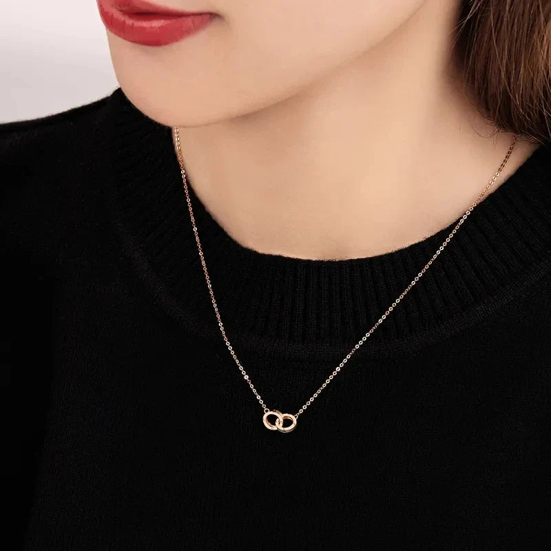 Strovlin 14K rose gold double ring pendant necklace for women, featuring elegant design and a polished finish.