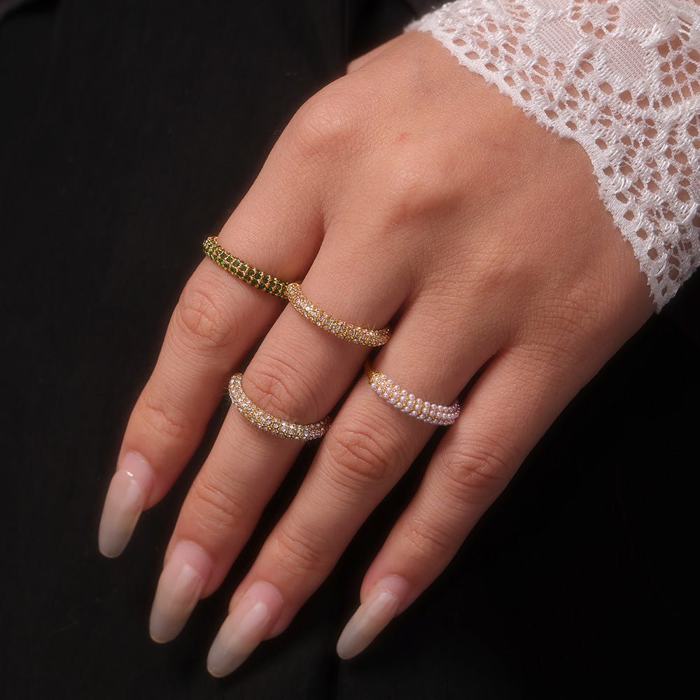 Unisex 18K gold pearl ring with PVD titanium steel band from Strovlin, featuring a sleek and elegant design.