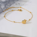 Gold Heart-Shaped Pendant Bracelet in Titanium Steel