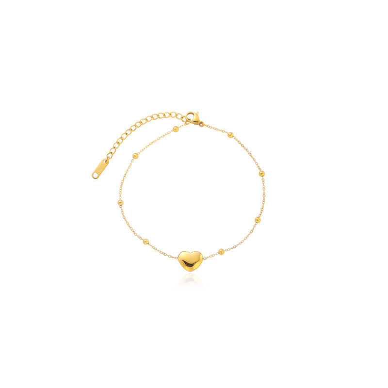Gold Heart-Shaped Pendant Bracelet in Titanium Steel